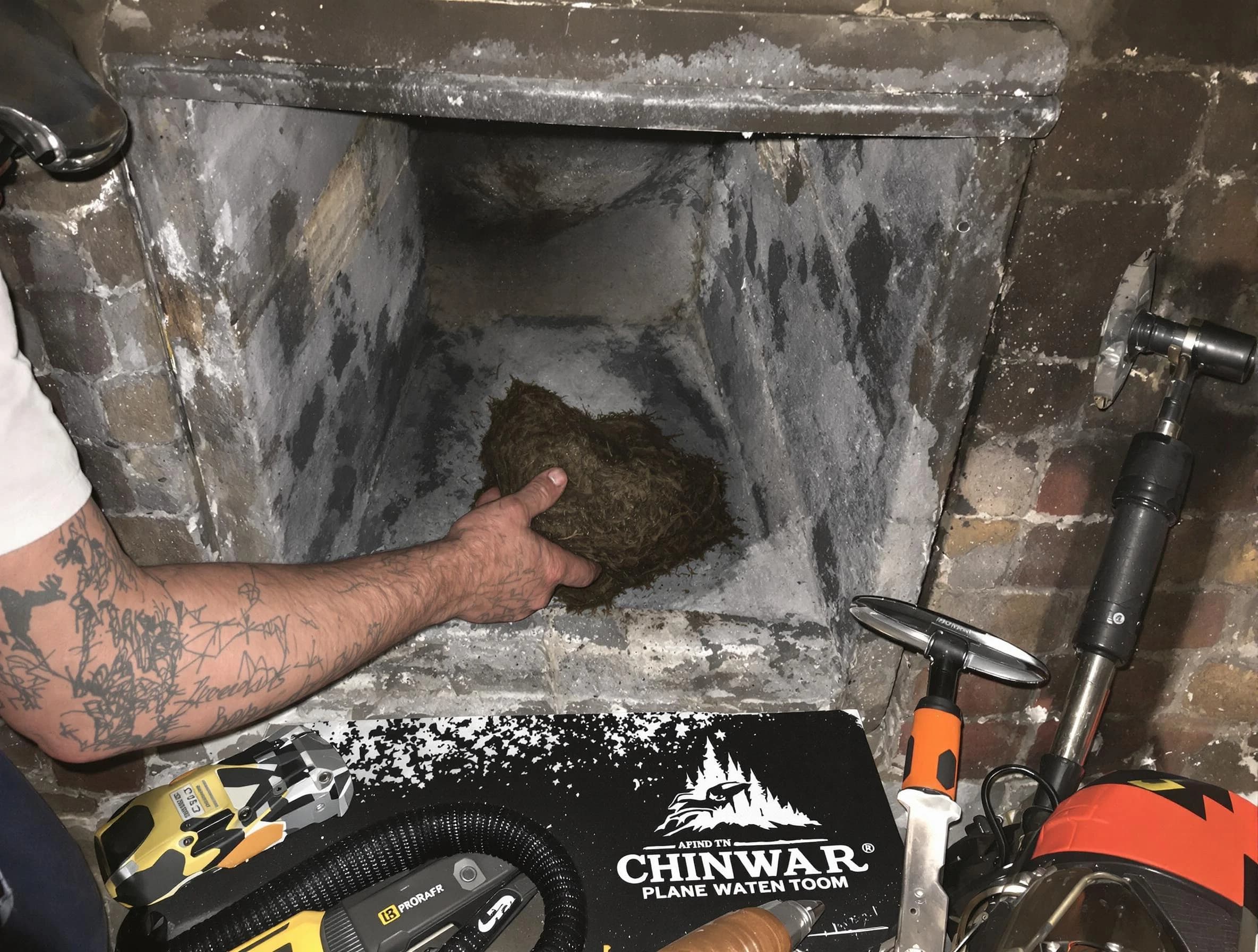 Neptune Chimney Sweep safely removing debris and screening chimney in Neptune, NJ